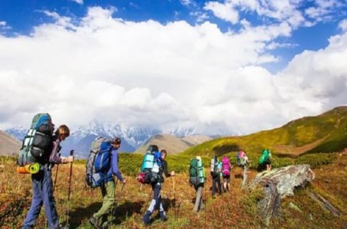 Travelers walking through the mountains in Uttarakhand ss14112017