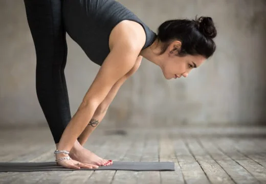 Ardha baddha padma uttanasana 6 young woman ardha uttanasana pose 1